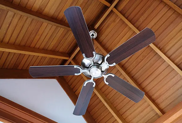 Stylish ceiling fan installed in the living room to improve airflow and home comfort.