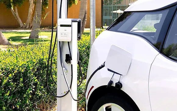 Level 2 EV charger in action, charging an electric vehicle with high-speed energy delivery.