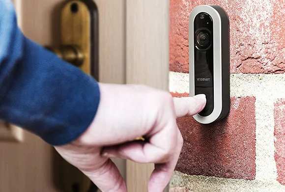 Modern smart doorbell installed at a residential home.